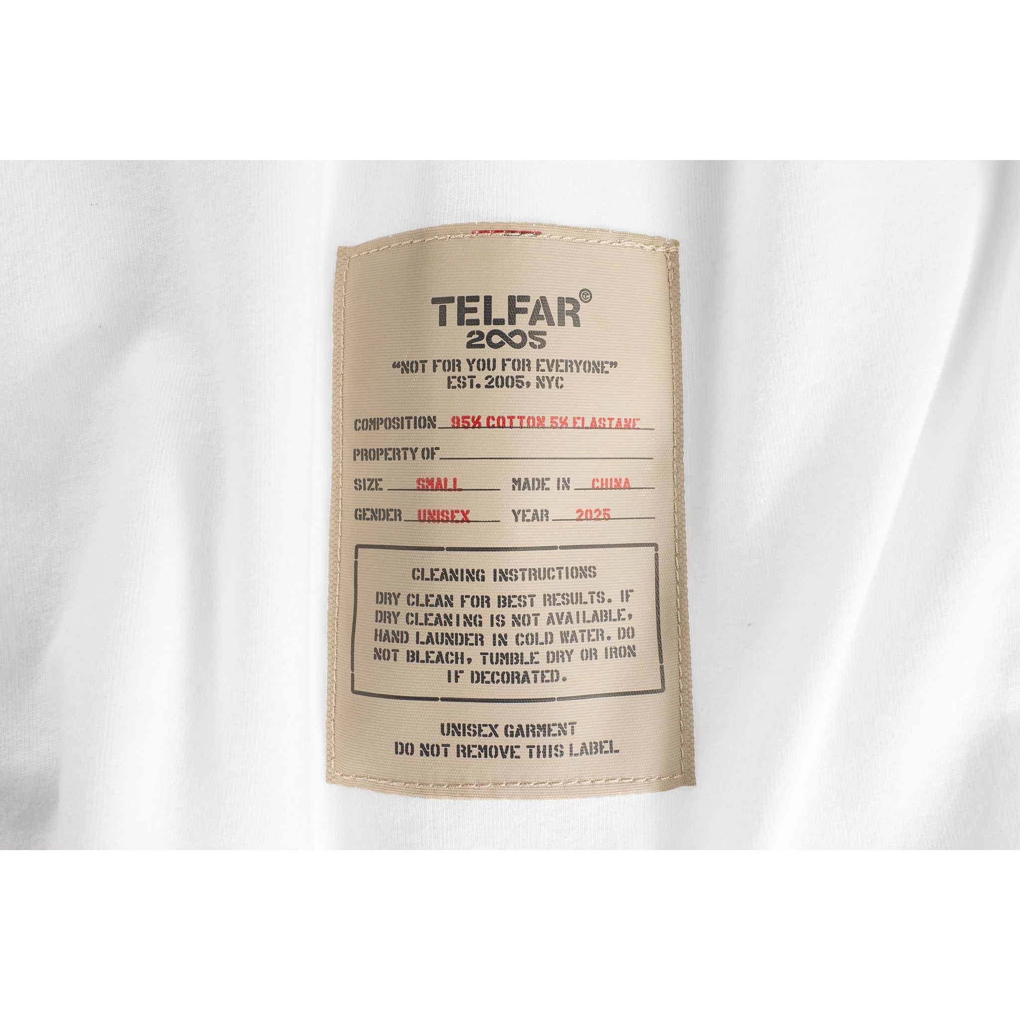 TELFAR-2005-LS-3_4-ZIP-MOCKNECK-SNAKE-EYES-WHITE-DETAIL-01-1