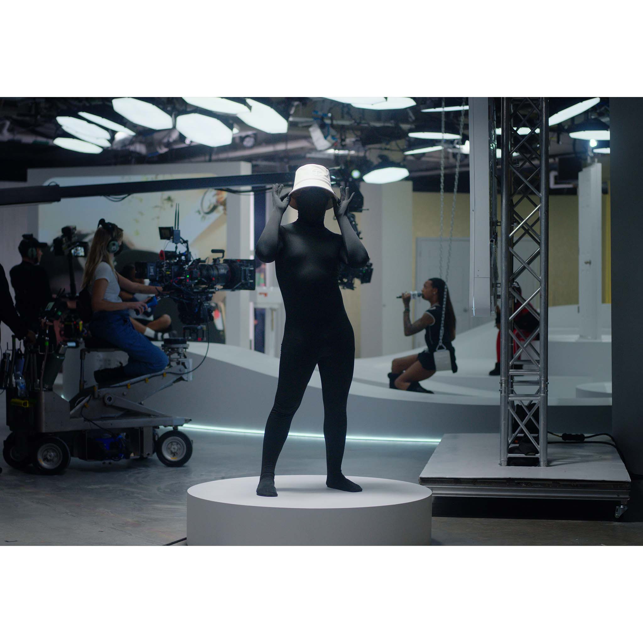 TELFAR-BUCKET-HAT-WHITE-ON-BODY_382e0a27-fe88-4eee-866b-75431828be16