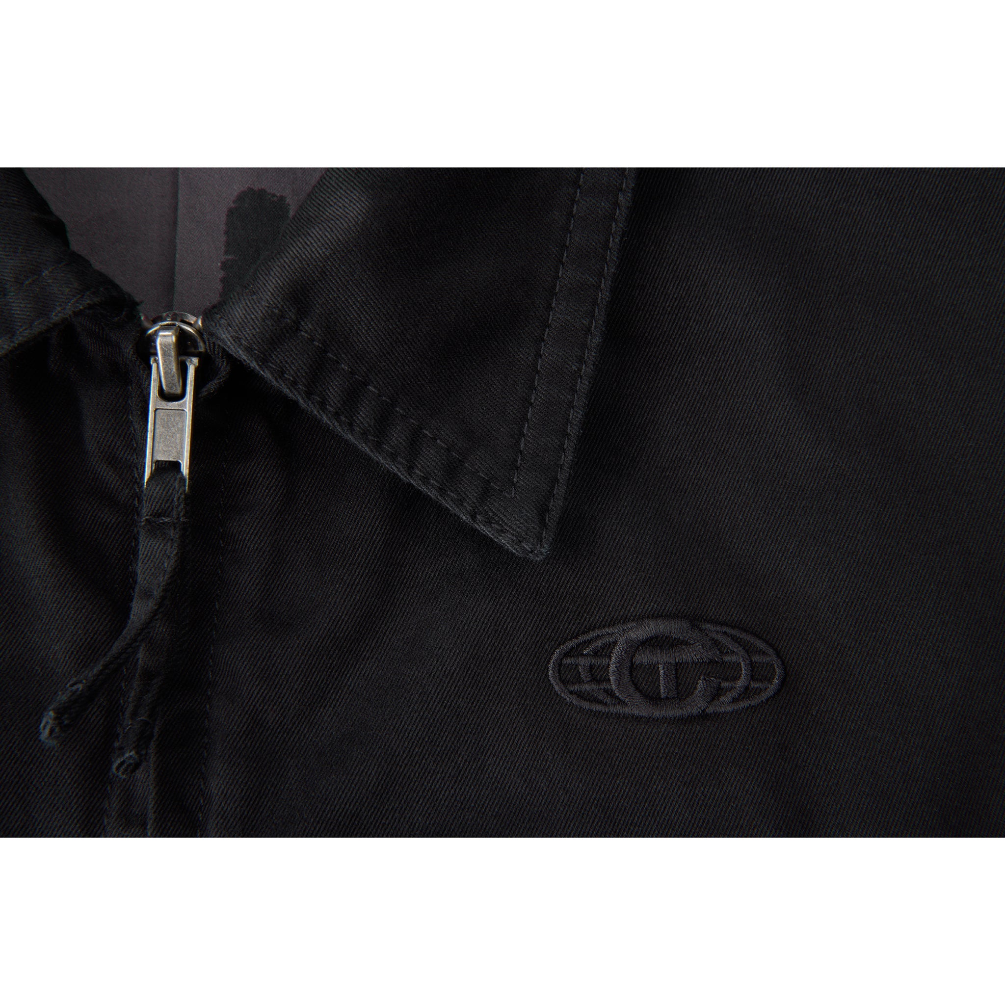 TELFAR-LONG-WORK-JACKET-BLACK-LOGO-DETAIL
