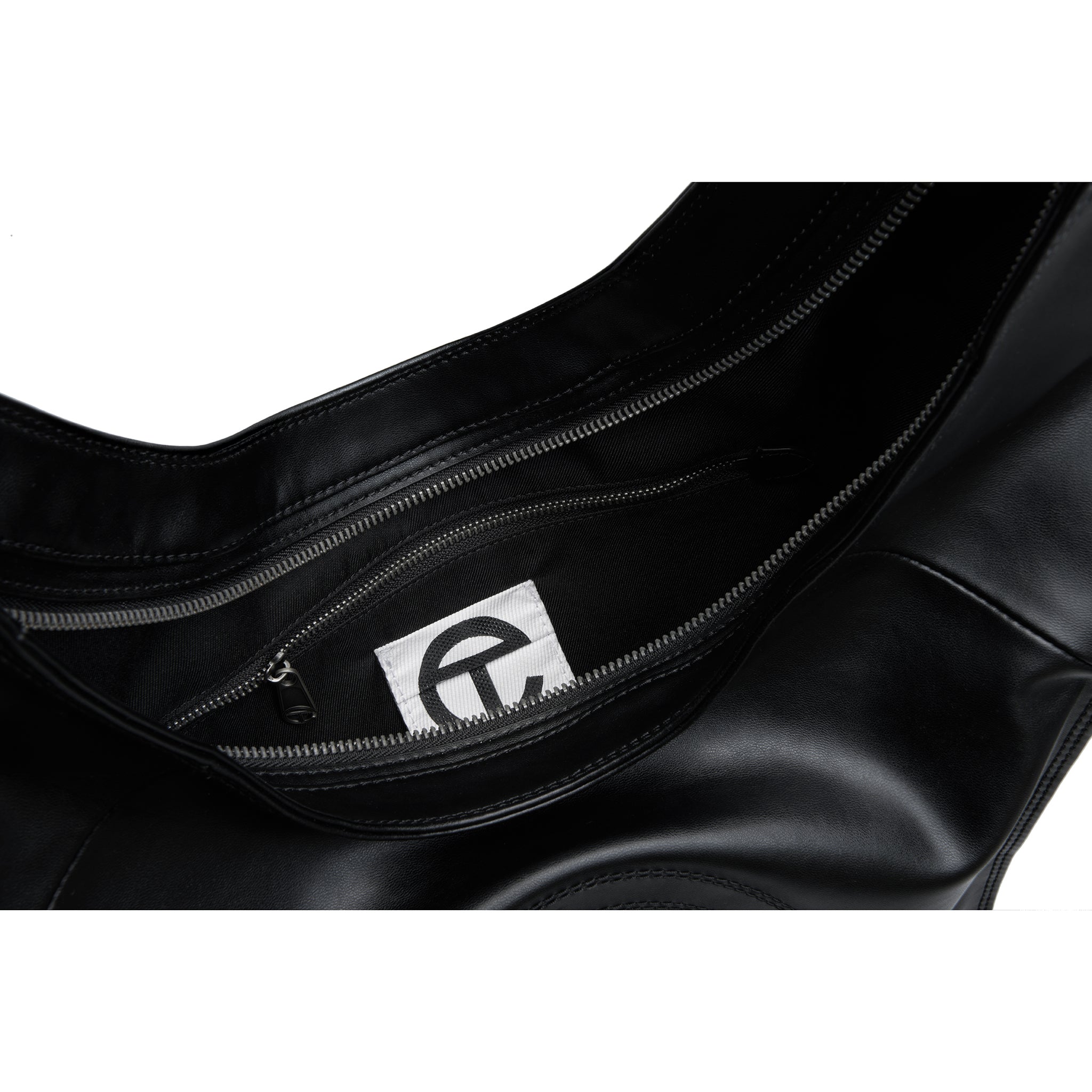 TELFAR-TIE-BAG-BLACK-INTERIOR_ede1c158-d68f-43bc-b3b0-94c36cd20c65-1