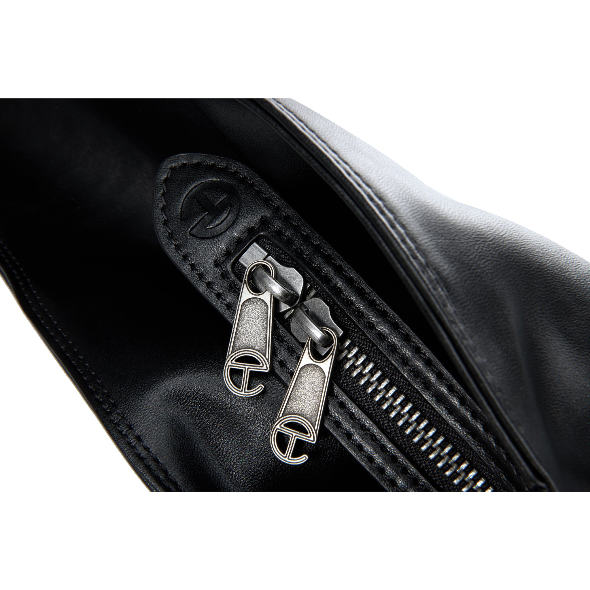 TELFAR-TIE-BAG-BLACK-ZIPPER-DETAIL_91b6d739-2b38-4bab-9002-cfce1ac43da0-1